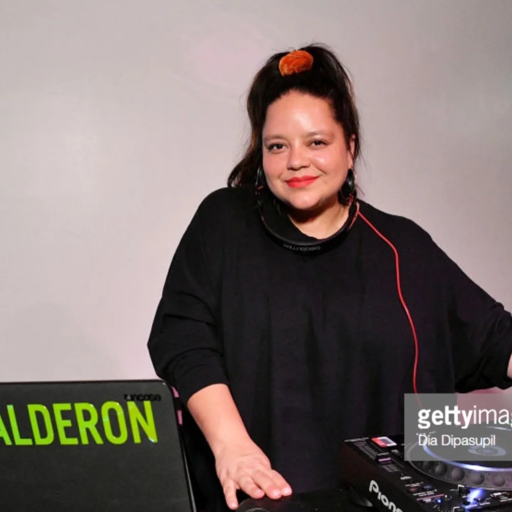 ANA CALDERON      A native of Peru, with a stop over in Kansas before moving to LA, Ana Calderon was born into a culture of music and art. She started her career in the record label industry previously overseeing LA based record label Dim Mak alongside Steve Aoki. She is now a sought-after DJ, curator, music supervisor and talent outreach. She has traveled the world with Radiohead Dj-ing pre/post shows and DJ'd with and hosted parties for the likes of Daft Punk, Paul McCartney, Arcade Fire, The Strokes, LCD Soundsystem, Zoe Kravitz, Halle Berry, Alexa Chung and clients such as Google, Apple, Amazon, Spotify, Burberry, MOCA, Galore, VICE, Dazed & Confused and Beats By Dre. As a talent connector, Ana has exclusive access to important influencers and tastemakers from film, TV, fashion, art and music. You can find her DJing & Hosting exclusive parties at Coachella, SXSW Sundance and Art Basel. In LA, Ana hosts two notorious events; the weekly Tuesday’s at Tenants and the monthly traveling world-music dance party, Nomerica. Ana also recently completed her training under Al Gore to be part of the international Climate Reality Leadership Corps and continues to work in fighting for sustainability and environmental justice.   INSTAGRAM.COM/ANA_SAYS